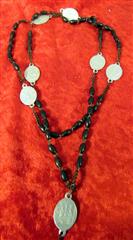 LOT OF TEN VINTAGE ROSARY AND PRAYER BEADS WITH CARRYING CASE